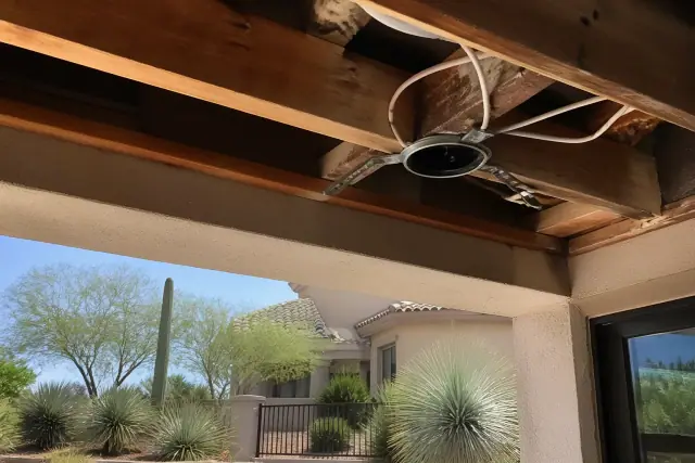 Recessed lighting housing and wiring inside a ceiling joist in a Glendale, AZ home under construction.
