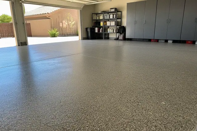 Completed epoxy flake flooring in a residential garage in Phoenix, AZ.