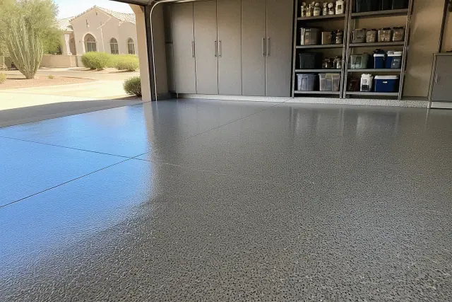 Completed epoxy garage floor with a high-gloss speckled finish in a residential garage in Peoria, AZ.