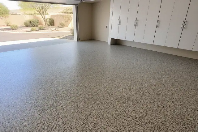 Newly installed industrial epoxy flooring in a residential garage in Chandler, AZ.