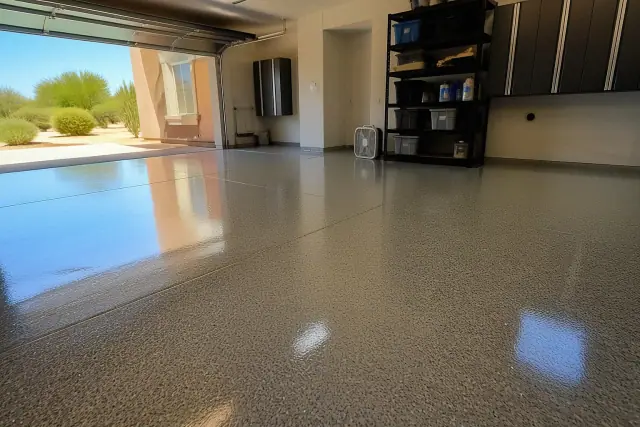Finished high-gloss industrial epoxy floor in a residential garage in Mesa, AZ.