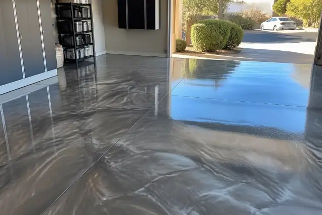 Metallic epoxy and polished concrete floor in a residential garage in Phoenix, AZ.
