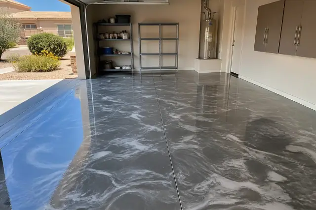 Metallic epoxy flooring with a glossy, marble-like finish in a residential garage in Goodyear, AZ.