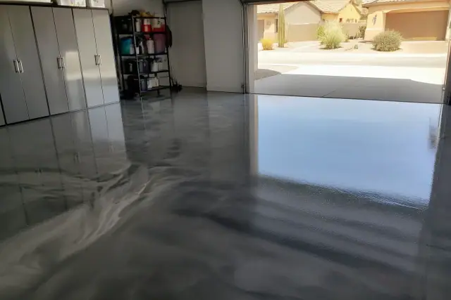 Metallic epoxy flooring with an iridescent finish in a residential garage in Phoenix, AZ.