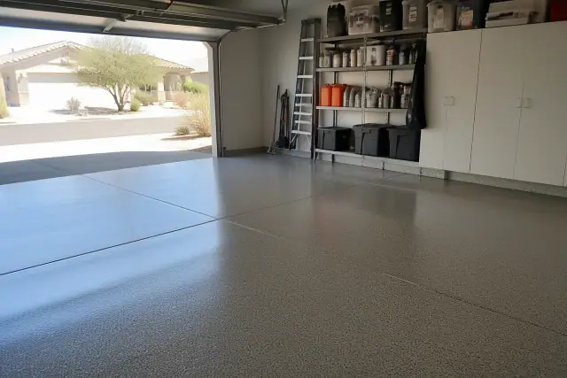 Completed polyaspartic floor coating inside a residential garage in Goodyear, AZ.