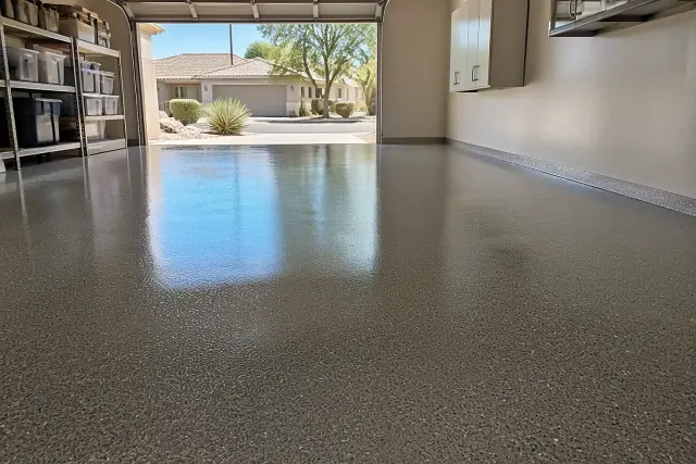 Polyaspartic floor coating with flake texture in a residential garage in Queen Creek, AZ.
