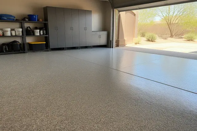Polyaspartic flake floor coating in a residential garage in Phoenix, AZ.
