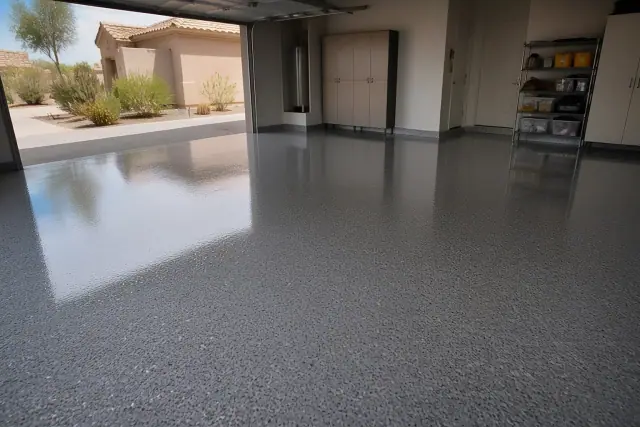 Completed residential epoxy flooring with a high-gloss flake finish in a garage in Goodyear, AZ.