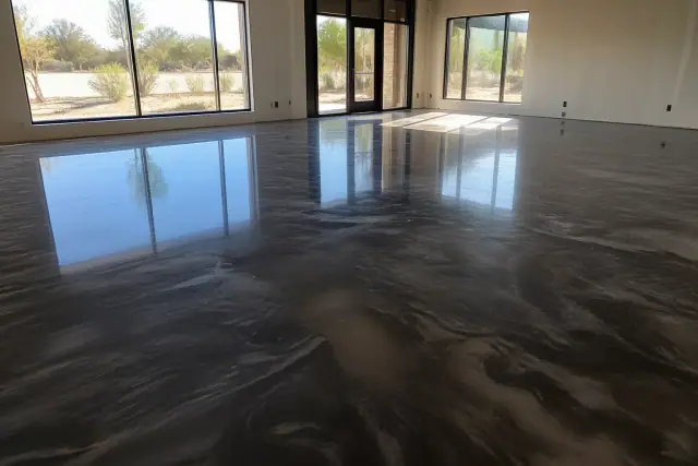 High-gloss metallic epoxy flooring in a retail showroom space in Phoenix, AZ.