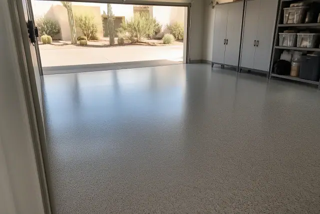 Completed epoxy garage floor with a smooth, glossy finish in a residential home in Phoenix, AZ.