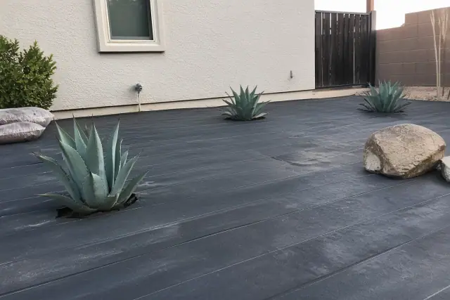 Xeriscape landscape design installation with agave plants and crushed granite on a jobsite in Phoenix, AZ.