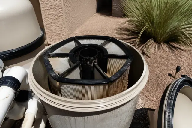 Pool filter grids inside an open housing during maintenance in Phoenix, AZ.