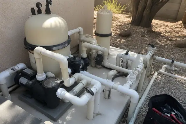 Pool repair with new PVC fittings and sealant on a pump system at a home in Glendale, AZ.