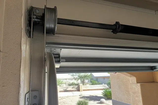 Garage door torsion spring and cable drum alignment on a home in Phoenix, AZ.
