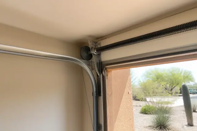 Extension spring system installed on a garage ceiling in Phoenix, AZ.