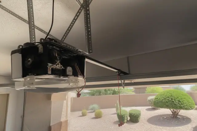 Garage door opener motor repair in progress at a home in Scottsdale, AZ.