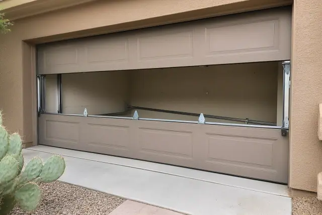 Garage door panel replacement in progress at a residential home in Scottsdale, AZ.