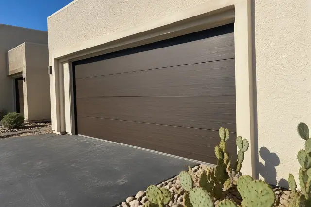 New wood and composite garage door panels installed on a home in Phoenix, AZ.
