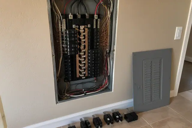 Circuit breaker replacement during a whole house rewiring project in a Glendale, AZ home.