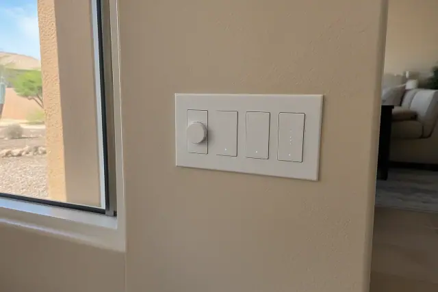 Smart switches and accessible controls installed on a wall in Phoenix, AZ.
