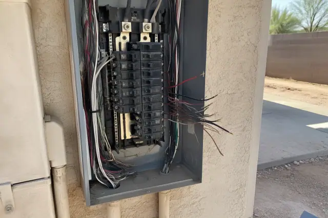 Electrical panel with disconnected wires during insulation resistance testing in Phoenix, AZ.