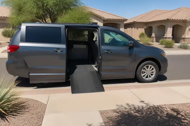 Medical transport van parked curbside with open sliding doors for passenger assistance in a suburban Gilbert, AZ