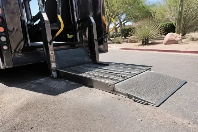 Heavy-duty hydraulic wheelchair ramp deployed on a concrete surface in Phoenix, AZ.