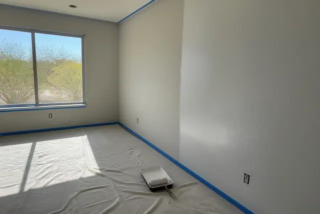 Interior painting in progress with a fresh coat of eggshell paint on walls in a Mesa, AZ home.