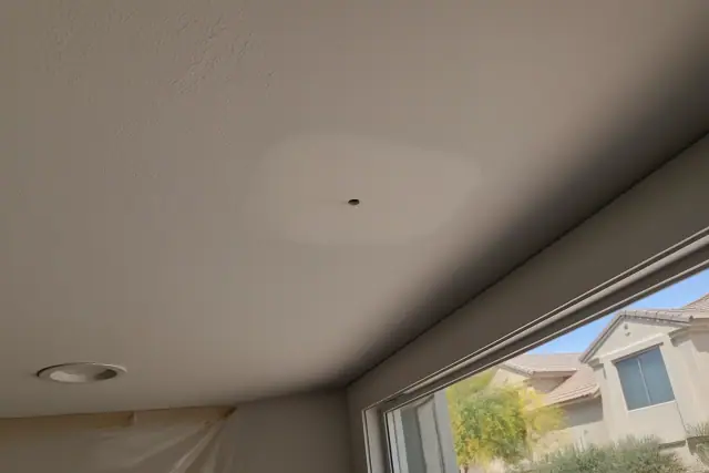 Sanded drywall patch with matched texture on a ceiling in a Phoenix, AZ home.