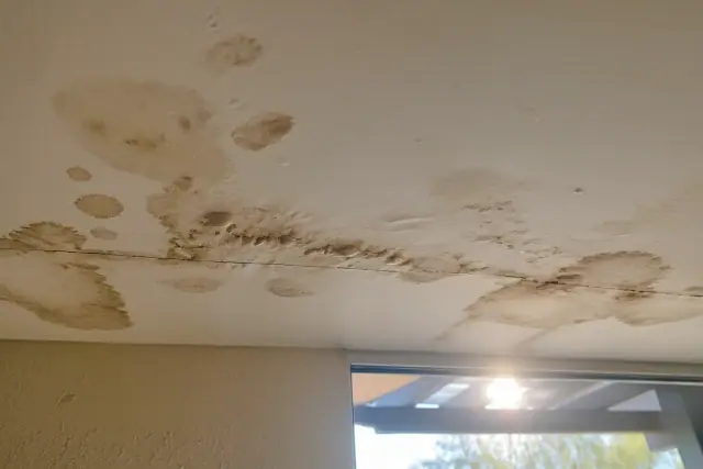Water-stained and bubbling drywall on a ceiling in a Phoenix, AZ home.