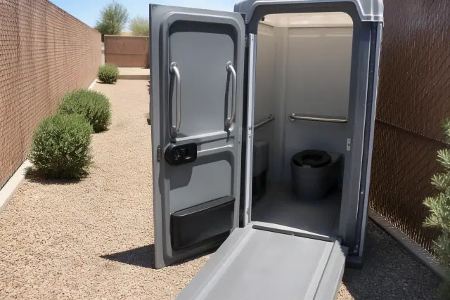 Grab bars and level entry ramp at an outdoor utility corridor in Phoenix, AZ.
