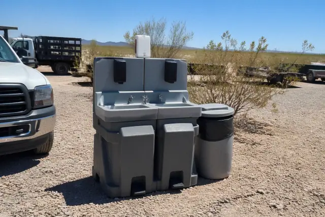 Dual handwashing station unit on a gravel surface at a jobsite in Phoenix, AZ.