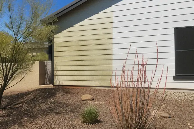 A residential siding section in Glendale, AZ showing the difference between mildew-covered and cleaned panels.