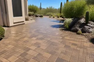 Cleaned and sealed interlocking stone paver path with a wet-look finish in a Phoenix, AZ backyard.