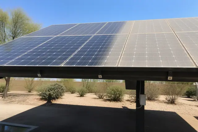 Solar panel array showing a clear contrast between dusty and cleaned surfaces at a jobsite in Phoenix, AZ.