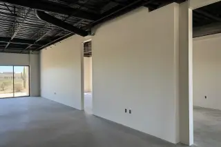Finished drywall partition with seamless joints in a commercial office in Phoenix, AZ.