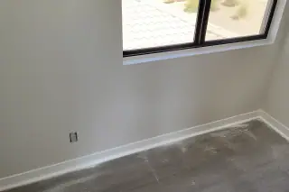 Smooth, sanded drywall repair on an interior wall in a home in Phoenix, AZ.