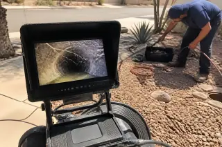 Sewer inspection monitor showing pipe wall conditions on a jobsite in Phoenix, AZ.