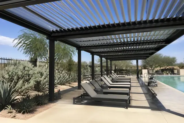 Adjustable aluminum louvered roof providing shade over a commercial pool deck in Phoenix, AZ.