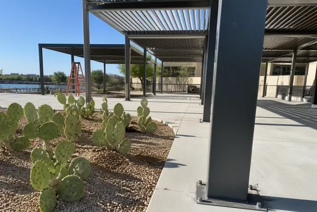 Steel support columns for a shade structure on a pool deck in Tempe, AZ.