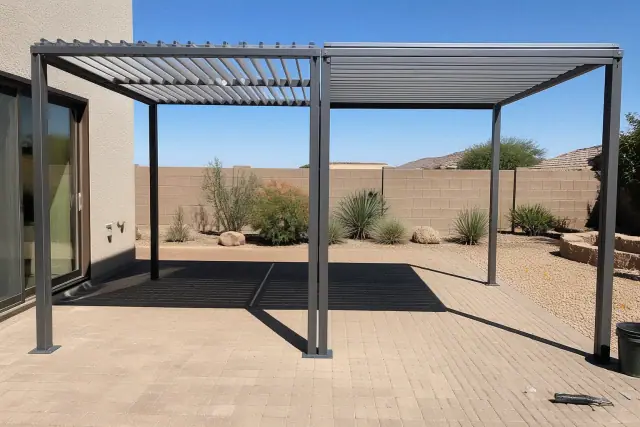 Roll-formed and extruded louvers installed over a paved patio in Phoenix, AZ.