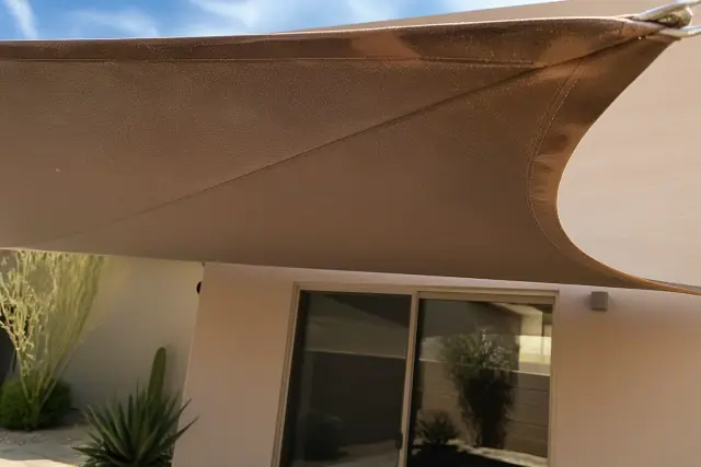 Sun-faded fabric on patio furniture seams and corners at a residential home in Phoenix, AZ.