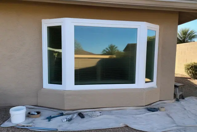 Newly installed bay and bow windows on a stucco home in Gilbert, AZ.