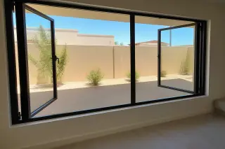 Finished casement and awning windows installed in a sun-drenched home in Phoenix, AZ.