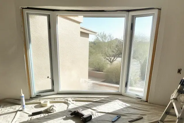 Energy-efficient glass package installation for a bay window in a Phoenix, AZ home.