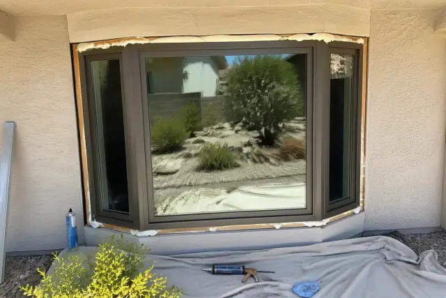 Bay and bow window frame installation in progress at a residential home in Phoenix, AZ.