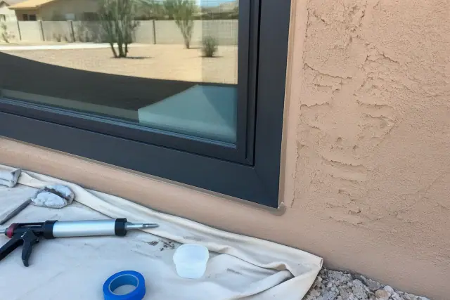 Fusion-welded window corner and reinforced frame in a stucco wall at a jobsite in Phoenix, AZ.