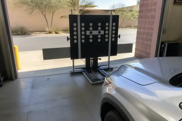 Static ADAS calibration target set up in a service bay in Phoenix, AZ.