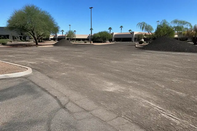 Clean asphalt parking lot after milling and removal at a retail center in Scottsdale, AZ.