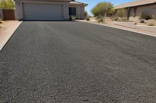Rough-textured asphalt surface after milling removal on a residential driveway in Surprise, AZ.